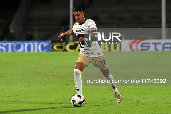 Robert Ergas #22 of the Pumas de la UNAM dribbles the ball during the match corresponding to round 16 of the Apertura 2024 tournament of the...