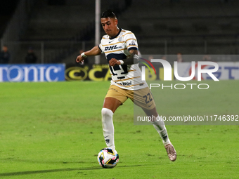 Robert Ergas #22 of the Pumas de la UNAM dribbles the ball during the match corresponding to round 16 of the Apertura 2024 tournament of the...