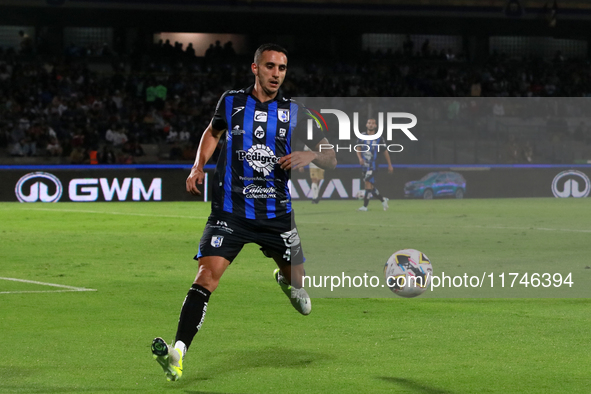 Franco Russo #4 of Queretaro watches the ball during the match corresponding to round 16 of the Apertura 2024 tournament of the Liga BBVA MX...