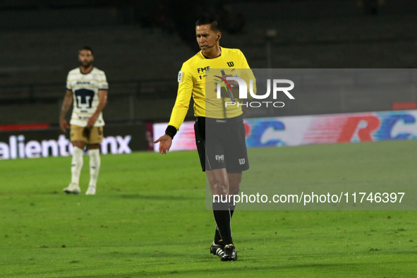 Referee Daniel Quintero Huitron officiates the match corresponding to round 16 of the Apertura 2024 tournament of the Liga BBVA MX, between...