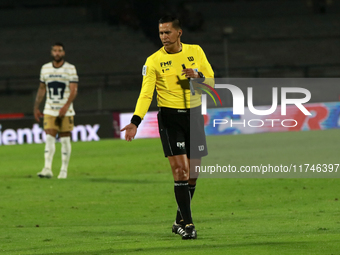 Referee Daniel Quintero Huitron officiates the match corresponding to round 16 of the Apertura 2024 tournament of the Liga BBVA MX, between...