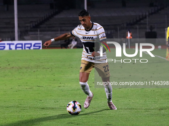 Robert Ergas #22 of the Pumas de la UNAM dribbles the ball during the match corresponding to round 16 of the Apertura 2024 tournament of the...