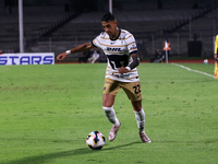 Robert Ergas #22 of the Pumas de la UNAM dribbles the ball during the match corresponding to round 16 of the Apertura 2024 tournament of the...