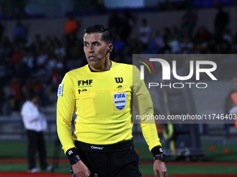 Referee Daniel Quintero Huitron officiates the match corresponding to round 16 of the Apertura 2024 tournament of the Liga BBVA MX, between...