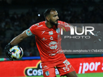 Goalkeeper Guillermo Allison #25 of Queretaro controls the ball during the match corresponding to round 16 of the Apertura 2024 tournament o...