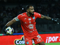 Goalkeeper Guillermo Allison #25 of Queretaro controls the ball during the match corresponding to round 16 of the Apertura 2024 tournament o...