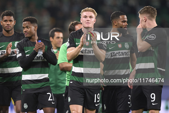 Players of Sporting CP celebrate victory after the UEFA Champions League match between Sporting CP and Manchester City at Jose Alvalade Stad...