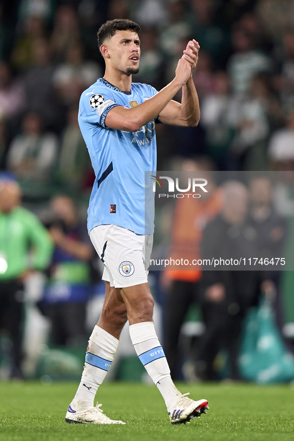 Matheus Nunes of Manchester City shows appreciation to the fans after the UEFA Champions League match between Sporting CP and Manchester Cit...