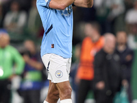 Matheus Nunes of Manchester City shows appreciation to the fans after the UEFA Champions League match between Sporting CP and Manchester Cit...