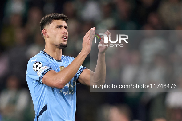 Matheus Nunes of Manchester City shows appreciation to the fans after the UEFA Champions League match between Sporting CP and Manchester Cit...