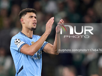 Matheus Nunes of Manchester City shows appreciation to the fans after the UEFA Champions League match between Sporting CP and Manchester Cit...