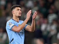 Matheus Nunes of Manchester City shows appreciation to the fans after the UEFA Champions League match between Sporting CP and Manchester Cit...