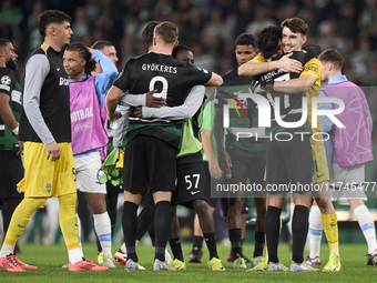 Players of Sporting CP celebrate victory after the UEFA Champions League match between Sporting CP and Manchester City at Jose Alvalade Stad...