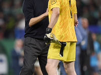 Pep Guardiola, Head Coach of Manchester City, greets Franco Israel of Sporting CP after the UEFA Champions League match between Sporting CP...