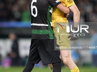 Zeno Debast of Sporting CP and Franco Israel of Sporting CP celebrate victory after the UEFA Champions League match between Sporting CP and...