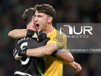 Zeno Debast of Sporting CP and Franco Israel of Sporting CP celebrate victory after the UEFA Champions League match between Sporting CP and...