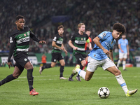 Rico Lewis of Manchester City plays during the UEFA Champions League match between Sporting CP and Manchester City at Jose Alvalade Stadium...