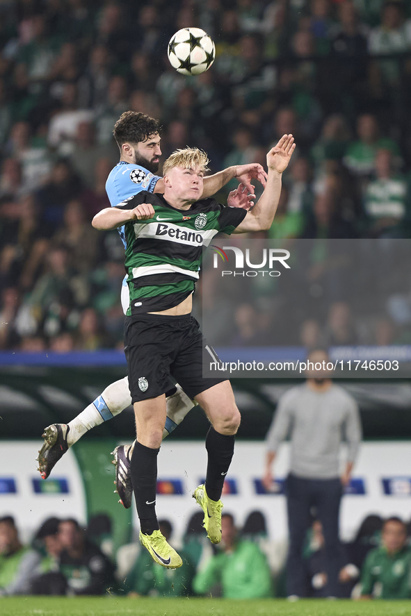 Josko Gvardiol of Manchester City competes for the ball with Conrad Harder of Sporting CP during the UEFA Champions League match between Spo...