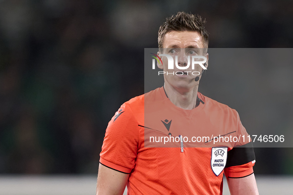 Referee Daniel Siebert looks on during the UEFA Champions League match between Sporting CP and Manchester City at Jose Alvalade Stadium in L...