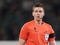 Referee Daniel Siebert looks on during the UEFA Champions League match between Sporting CP and Manchester City at Jose Alvalade Stadium in L...