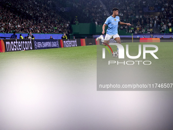 Matheus Nunes of Manchester City is in action during the UEFA Champions League match between Sporting CP and Manchester City at Jose Alvalad...