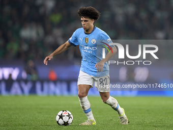 Rico Lewis of Manchester City plays during the UEFA Champions League match between Sporting CP and Manchester City at Jose Alvalade Stadium...