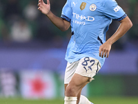 Rico Lewis of Manchester City plays during the UEFA Champions League match between Sporting CP and Manchester City at Jose Alvalade Stadium...