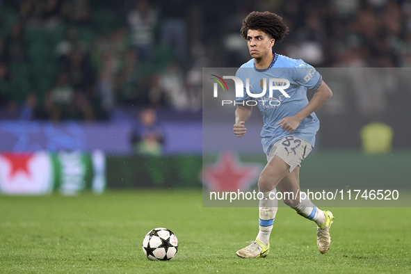 Rico Lewis of Manchester City plays during the UEFA Champions League match between Sporting CP and Manchester City at Jose Alvalade Stadium...