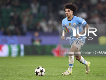 Rico Lewis of Manchester City plays during the UEFA Champions League match between Sporting CP and Manchester City at Jose Alvalade Stadium...