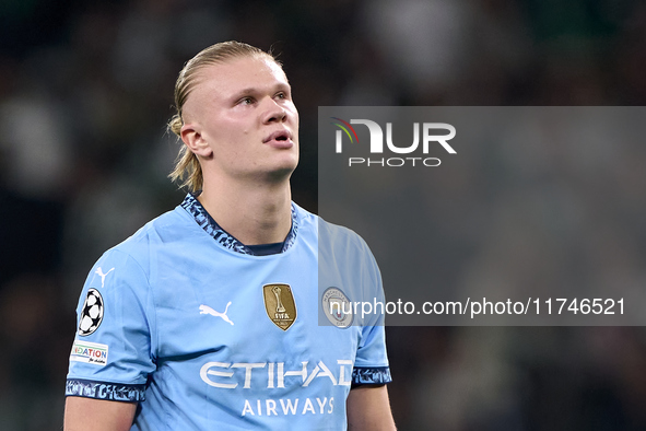 Erling Haaland of Manchester City reacts after missing a penalty kick during the UEFA Champions League match between Sporting CP and Manches...