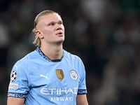 Erling Haaland of Manchester City reacts after missing a penalty kick during the UEFA Champions League match between Sporting CP and Manches...