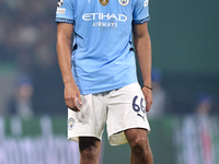 Jahmai Simpson-Pusey of Manchester City looks on during the UEFA Champions League match between Sporting CP and Manchester City at Jose Alva...