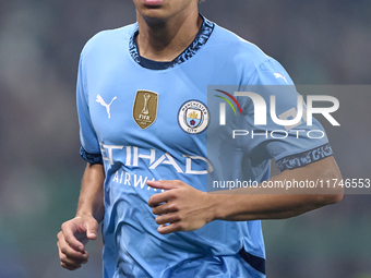 Rico Lewis of Manchester City looks on during the UEFA Champions League match between Sporting CP and Manchester City at Jose Alvalade Stadi...