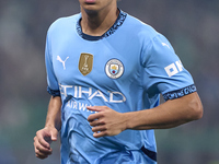 Rico Lewis of Manchester City looks on during the UEFA Champions League match between Sporting CP and Manchester City at Jose Alvalade Stadi...