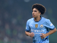 Rico Lewis of Manchester City looks on during the UEFA Champions League match between Sporting CP and Manchester City at Jose Alvalade Stadi...