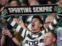 A Sporting CP fan shows support during the UEFA Champions League match between Sporting CP and Manchester City at Jose Alvalade Stadium in L...