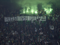 Sporting CP fans light flares in the stand during the UEFA Champions League match between Sporting CP and Manchester City at Jose Alvalade S...