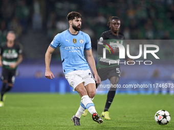 Josko Gvardiol of Manchester City plays during the UEFA Champions League match between Sporting CP and Manchester City at Jose Alvalade Stad...