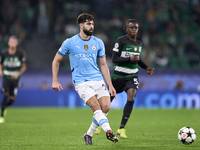 Josko Gvardiol of Manchester City plays during the UEFA Champions League match between Sporting CP and Manchester City at Jose Alvalade Stad...