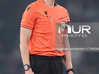 Referee Daniel Siebert reacts during the UEFA Champions League match between Sporting CP and Manchester City at Jose Alvalade Stadium in Lis...