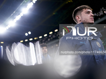 James McAtee of Manchester City looks on before the UEFA Champions League match between Sporting CP and Manchester City at Jose Alvalade Sta...