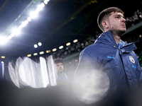 James McAtee of Manchester City looks on before the UEFA Champions League match between Sporting CP and Manchester City at Jose Alvalade Sta...