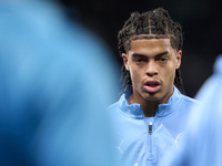 Jahmai Simpson-Pusey of Manchester City looks on during the warm-up before the UEFA Champions League match between Sporting CP and Mancheste...