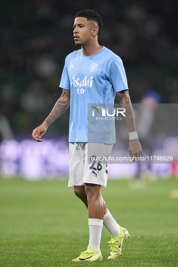 Savinho of Manchester City warms up before the UEFA Champions League match between Sporting CP and Manchester City at Jose Alvalade Stadium...