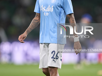 Savinho of Manchester City warms up before the UEFA Champions League match between Sporting CP and Manchester City at Jose Alvalade Stadium...