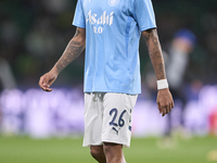 Savinho of Manchester City warms up before the UEFA Champions League match between Sporting CP and Manchester City at Jose Alvalade Stadium...