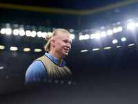 Erling Haaland of Manchester City warms up before the UEFA Champions League match between Sporting CP and Manchester City at Jose Alvalade S...