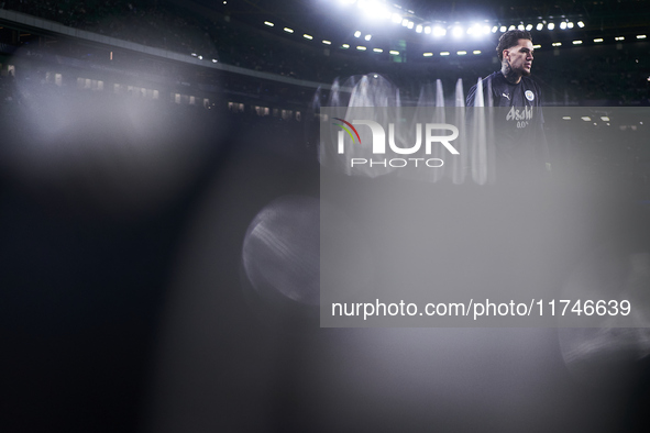 Ederson of Manchester City warms up before the UEFA Champions League match between Sporting CP and Manchester City at Jose Alvalade Stadium...