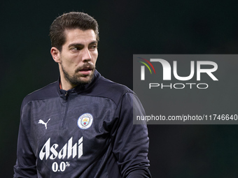 Stefan Ortega of Manchester City warms up before the UEFA Champions League match between Sporting CP and Manchester City at Jose Alvalade St...