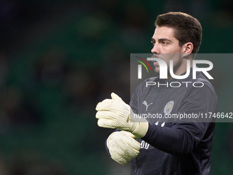 Stefan Ortega of Manchester City warms up before the UEFA Champions League match between Sporting CP and Manchester City at Jose Alvalade St...